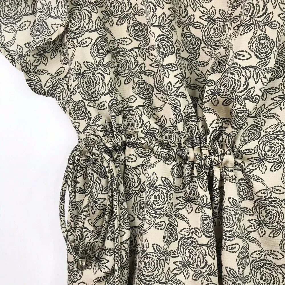 AKIRA Medium M Printed Asymmetrical Cinch Blouse Top Cream Black Floral Print